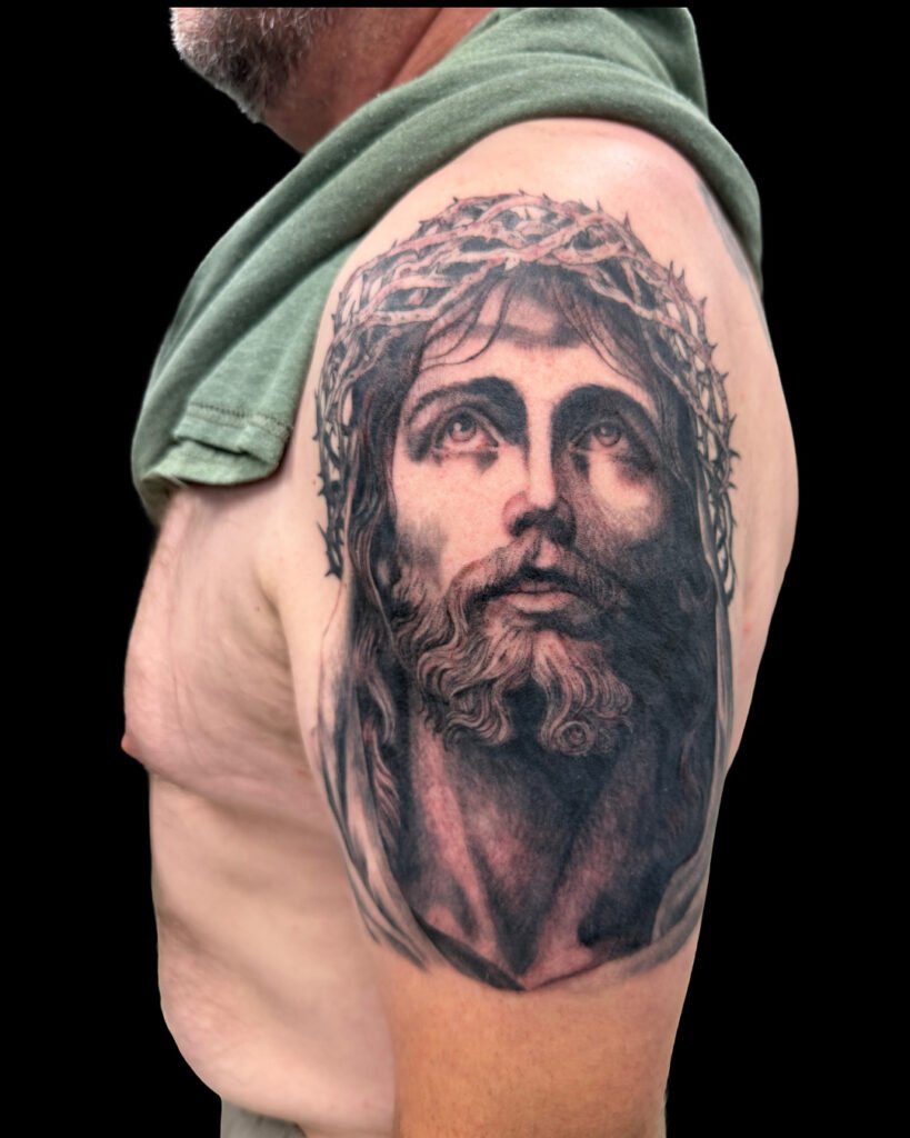 black and grey jesus portrait tattoo middletown ri
