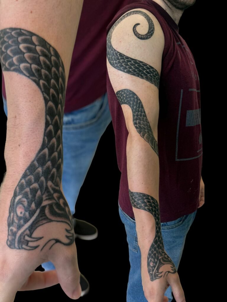 Snake sleeve tattoo