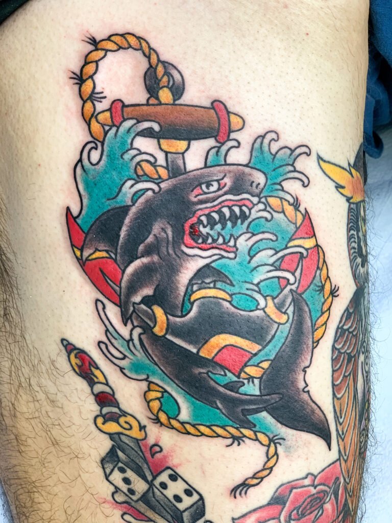 Traditional shark and anchor tattoo
