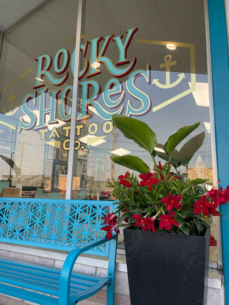 "Rocky Shores Tattoo Co. storefront with vintage neon sign, West Main Road, Middletown RI